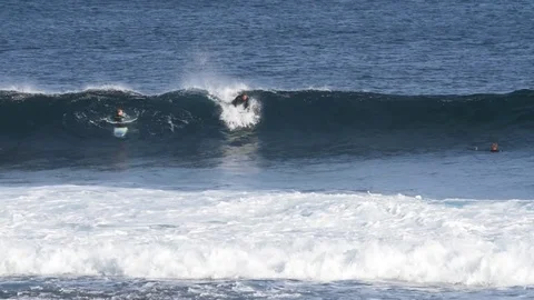 Skillful surfer riding a big wave Stock Footage 71537485