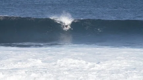 Skillful surfer riding a big wave Stock Footage 71537583