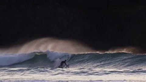 Skillful Surfer riding on big wave in sea Video stock 71542112