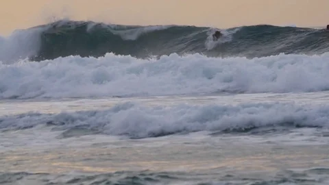 Skillful surfer riding a giant wave Stock Footage 71540129