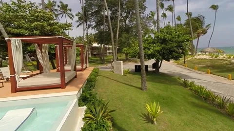 Skim the water over pool front suites in paradise Stock Footage 54405256