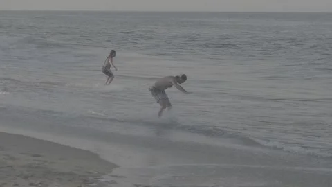 Skimboarders Stock Footage 168110621
