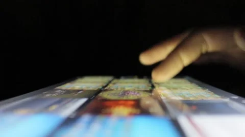 Skimming Through A Pictures On Touch Tablet Computer Vídeo Stock 47263399