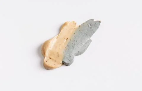 Skin scrub smear on white background. Cosmetic product Stock Photos