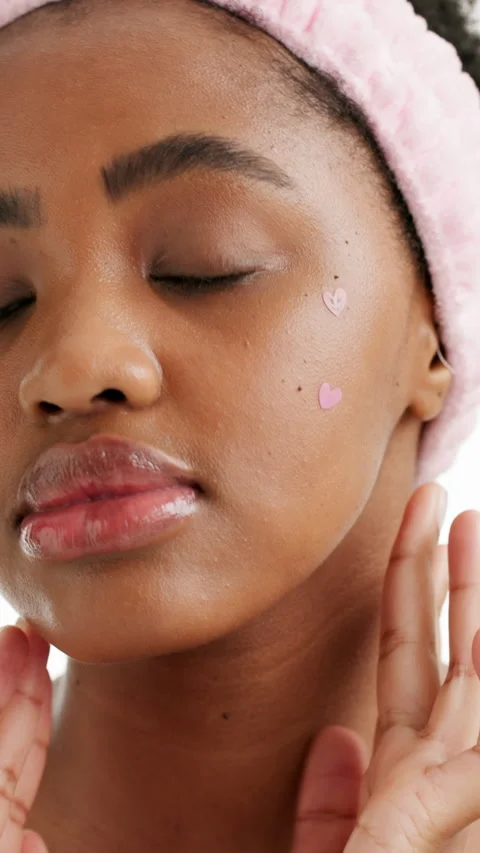 Skincare, acne patch and face of black woman in studio for self care, beauty Stock Footage 333696443