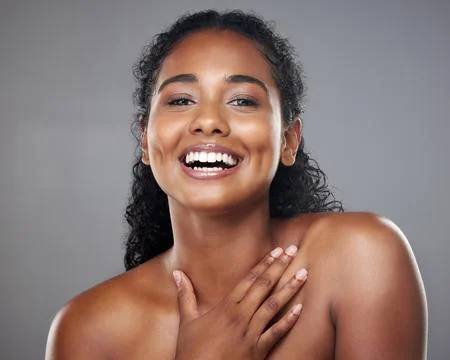 Skincare, beauty and portrait of a happy woman in a studio with a cosmetic Stock Photos