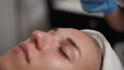 A Skincare Treatment Session is Currently in Progress to Enhance Your Beauty and Stock Footage 317407535