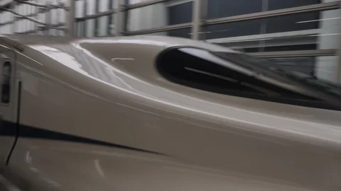 Skinkansen Bullet Train on Platform Pass By  4K Stock-Footage 104115177