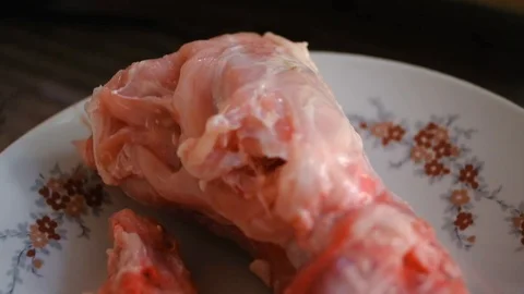 Skinned torso and head of a Rabbit on a plate, waiting to be cooked. Stock Footage 100883634