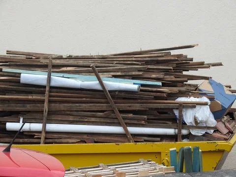 Skip full of wood Stock Photos