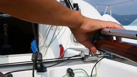 Skipper at the helm of a sailboat Stock Footage 130004441