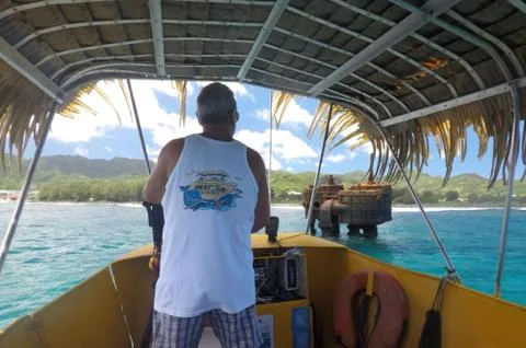 Skipper sail the Raro Reef Sub Marine Life Eco Tours in Avarua Rarotonga Cook Stock Photos