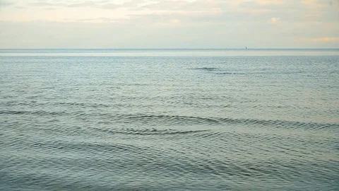 Skipping stone on water Stock-Footage 72903163