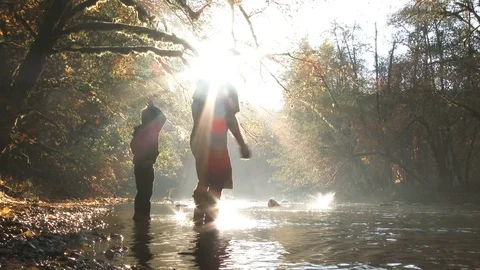 Skipping Stones With Son At The River Stock Footage 81872847