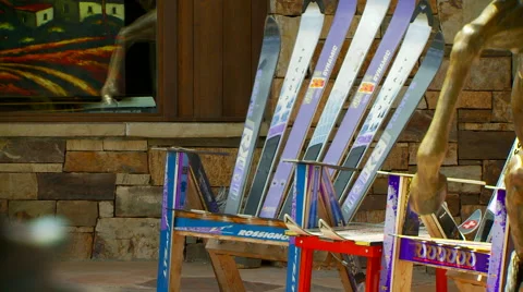 Skis arranged on table Stock Footage 57814230