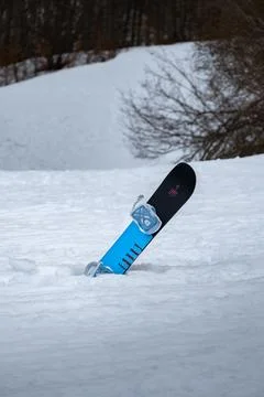 Skis planted vertically in deep snow Stock Photos