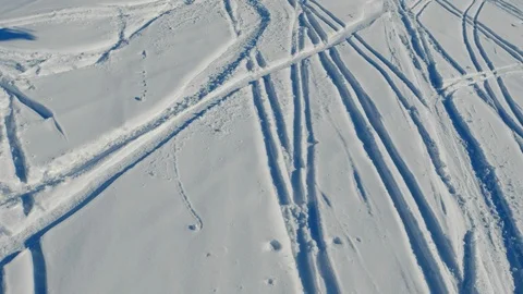 Skis traces on snow surface in different directions. Stock Footage 112683441