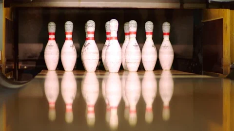 Skittles on the bowling path and the ball knocking them Stock Footage 81186810