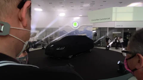 Skoda Octavia Electric model inside showroom car dealership - stroboscopic Stock Footage 206863136