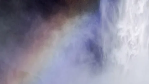 Skógafoss Waterfall forms a rainbow. Close-up view Natural Wonder. Stock Footage 108465998