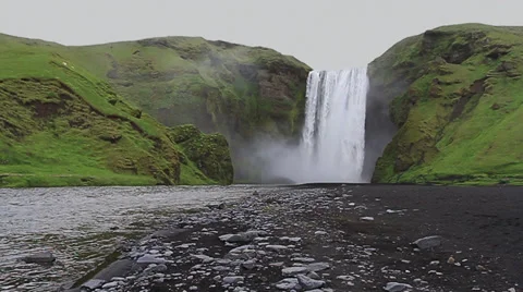 Skógafoss waterfall: front view / slow motion / Iceland 動画素材 34438341