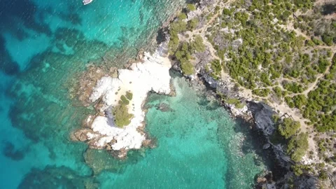 Skopelos Amarantos Bay Drone Forward Top Down Reflections Stock Footage 336914955