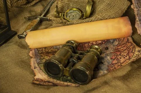 Skull and adventure objects for exploration. Stock Photos
