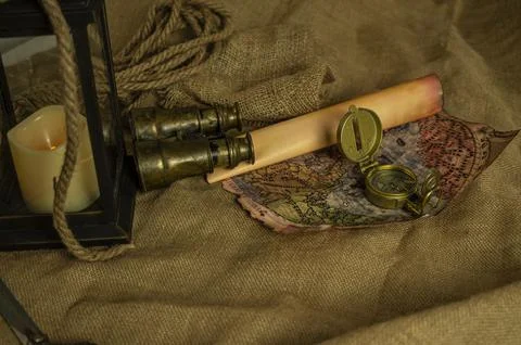 Skull and adventure objects for exploration. Stock Photos