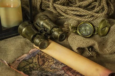Skull and adventure objects for exploration. Stock Photos