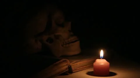 The skull and books Stock Footage 22237771