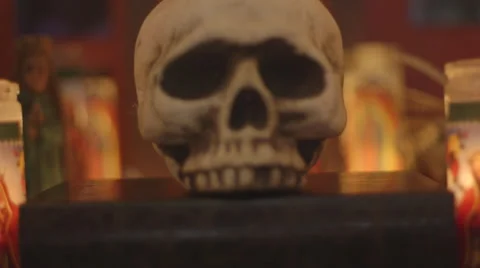Skull and candles pull focus Stock Footage 49781321