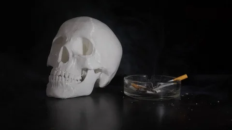 Skull and сigarette Stock-Footage 98173710