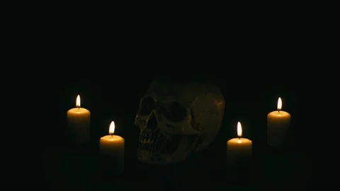 Skull between candles, halloween theme Stock Footage 94898478