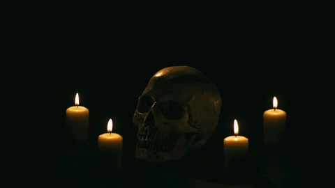 Skull between candles, halloween theme Stock Footage 94899604