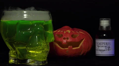 Skull container, smoke and pumpkin Stock Footage 54914031