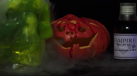 Skull container, smoke and pumpkin Stock Footage 54915280