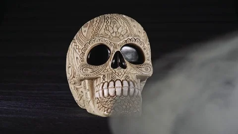 Skull covered in smoke on a dark background. Stock Footage 83391444