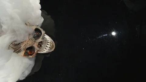 Skull covered in smoke on a dark background. top view Stock Footage 87035349