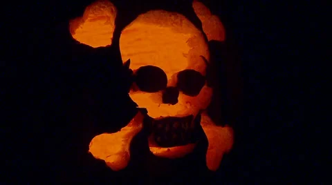 Skull &amp; Crossbones in Pumpkin RACK FOCUS  IN &amp; OUT Stock Footage 32477668