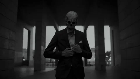 Skull Head Man buttoning his Suit Video stock 259884470