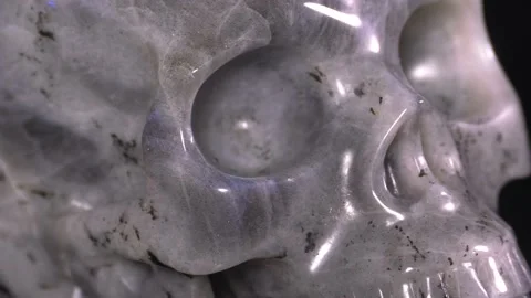 Skull made of Labradorite Crystal Stone Rotating Stock Footage 139799532