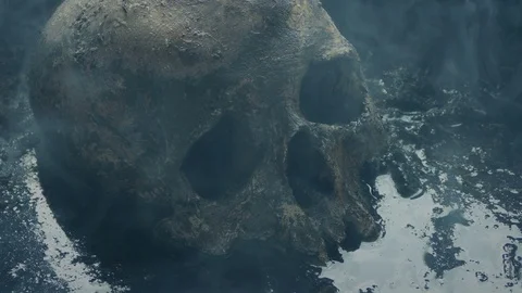 Skull In The Mud With Smoke Passing Over It Stock Footage 117867433