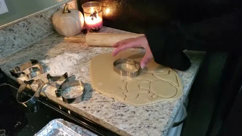 Skull Shape Cut from Dough for Sugar Cookies Stock Footage 213723396