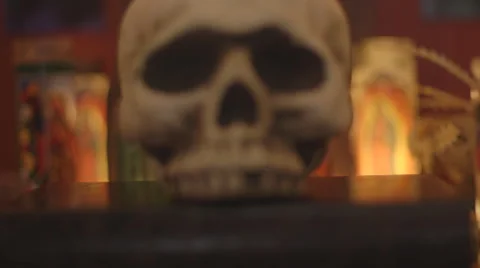 Skull still with candles burning Stock Footage 49781801