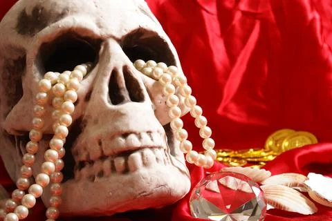 Skull With Treasure Stock Photos