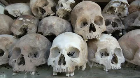 Skulls and bones in Killing field, cambodia, static camera Stock Footage 12172080
