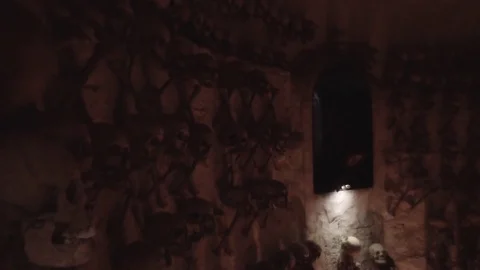 Skulls and bones in the ossuary Stock Footage 72828886
