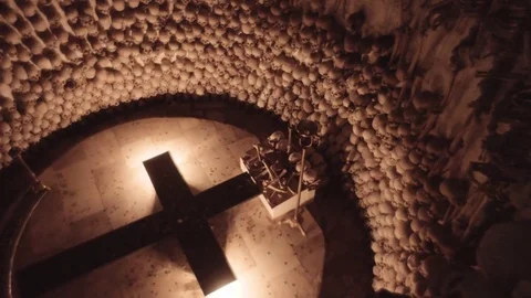 Skulls and bones in the ossuary Stock Footage 72829117