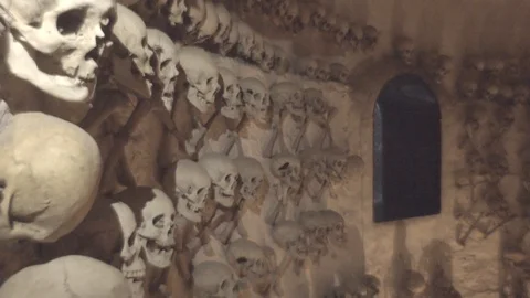 Skulls and bones in the ossuary Stock Footage 89826636