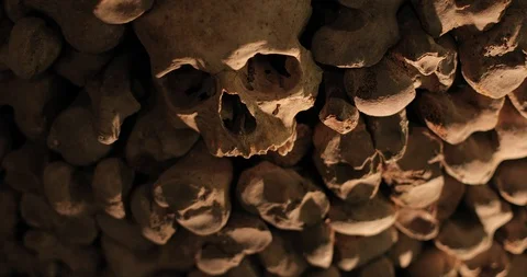Skulls and bones in a wall Stock Footage 127329262